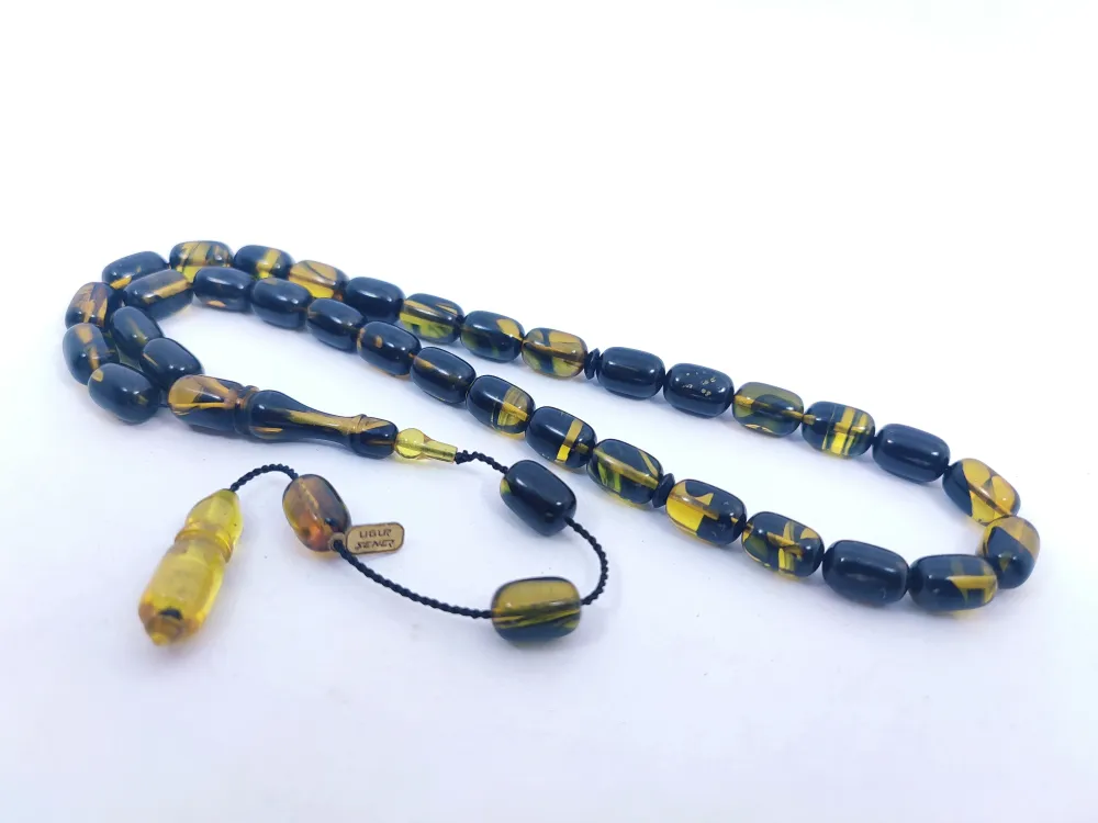 Uğur Şener Usta Eseri̇ 0.6 Şeffaf Deli̇m Çi̇ft Kat Ci̇lalı Sıkma Kehri̇bar