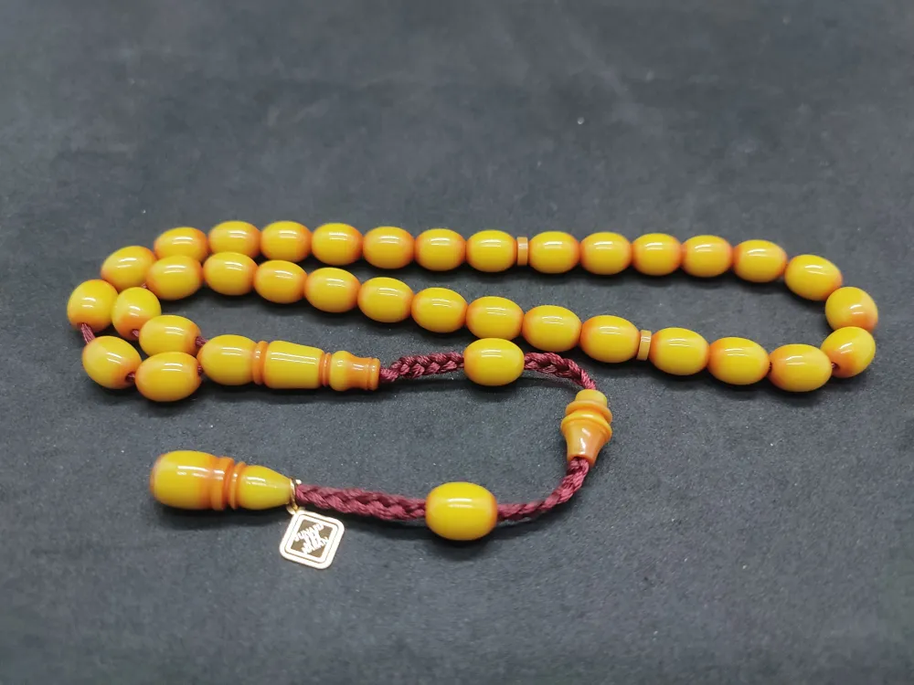 Junai̇d Hasan Usta Eseri̇ 12 Kat İpe Di̇zi̇lmi̇ş Anti̇k Model Eski̇ Sıkma Kehri̇bar küçük resim 2