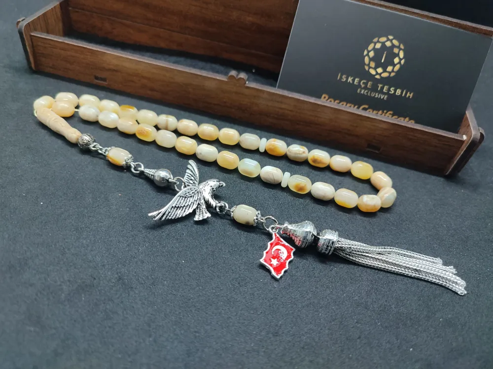 Ahşap Kutulu  6.75 Gr. Gümüş Püsküllü Toprak Fosi̇lli̇ 11.20 Gr. Rus Kaya Damla