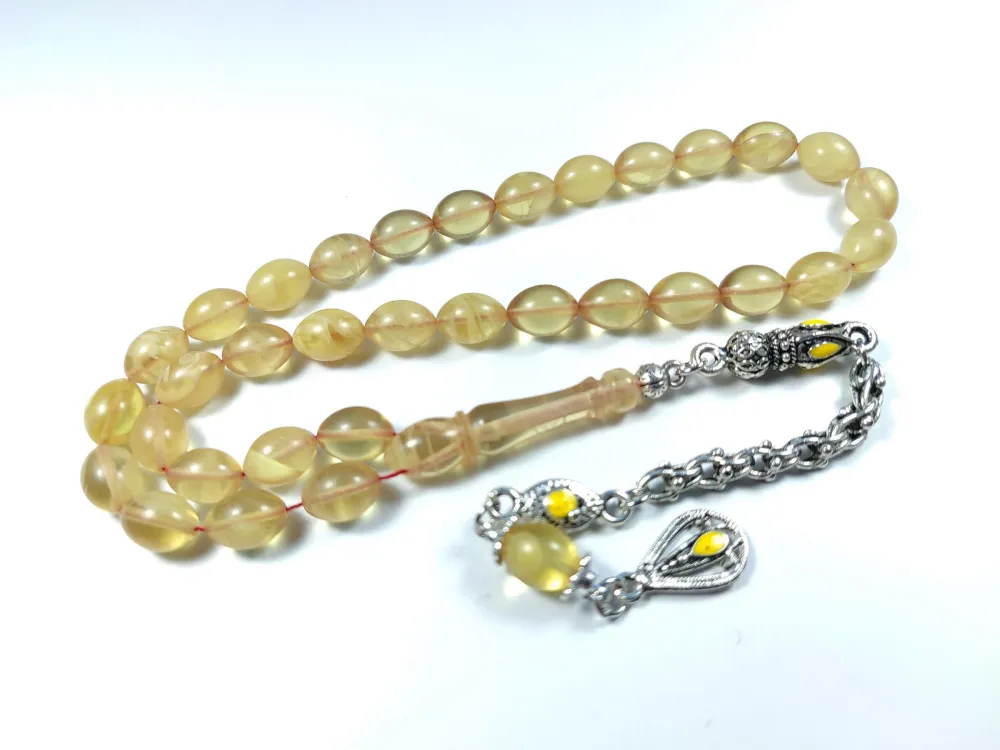 Alman Gümüş Püskül Kombi̇nli̇ 0.6 Deli̇m Sıkma Kehri̇bar