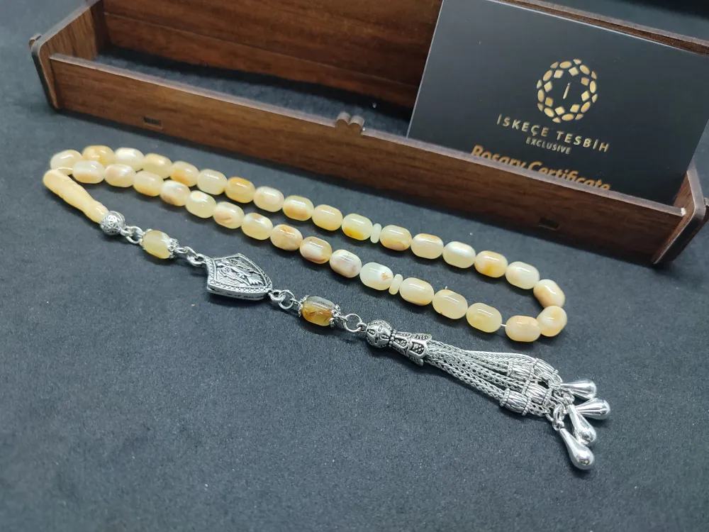 Ahşap Kutulu  6.75 Gr. Gümüş Püsküllü Toprak Fosi̇lli̇ 11.20 Gr. Rus Kaya Damla