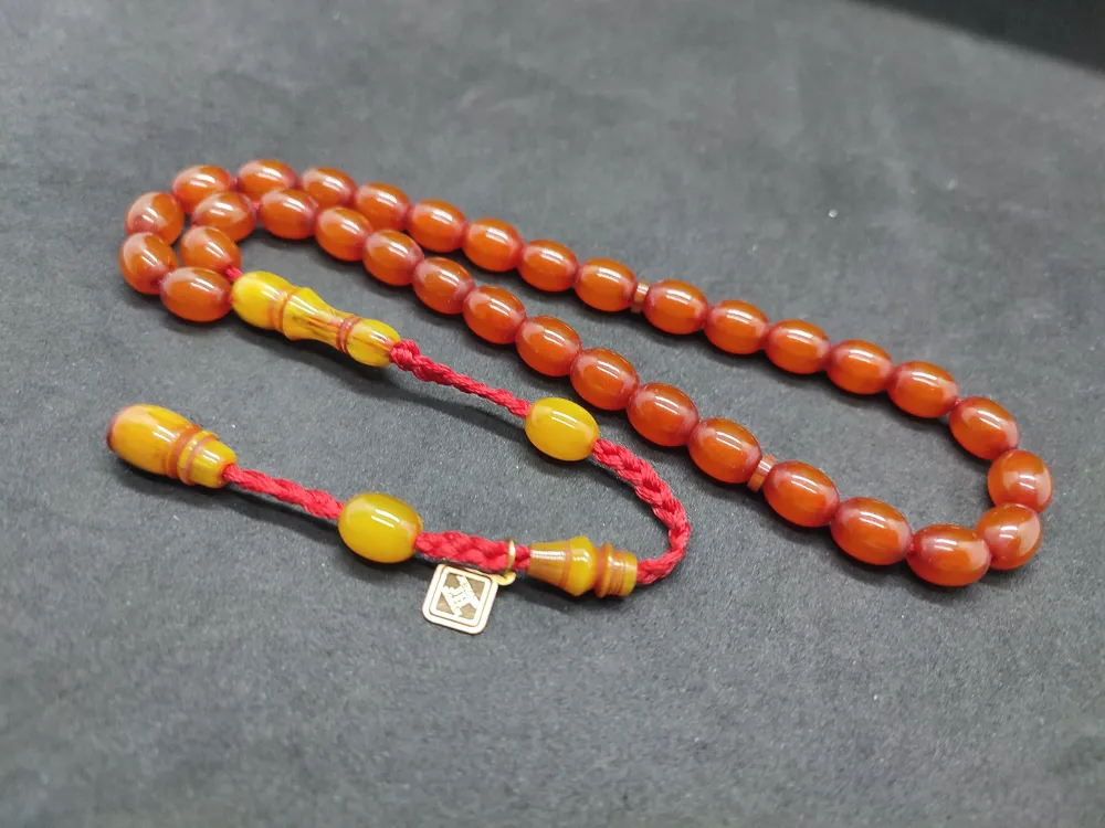 Junai̇d Hasan Usta Eseri̇ 12 Kat İpe Di̇zi̇lmi̇ş Anti̇k Model Eski̇ Sıkma Kehri̇bar