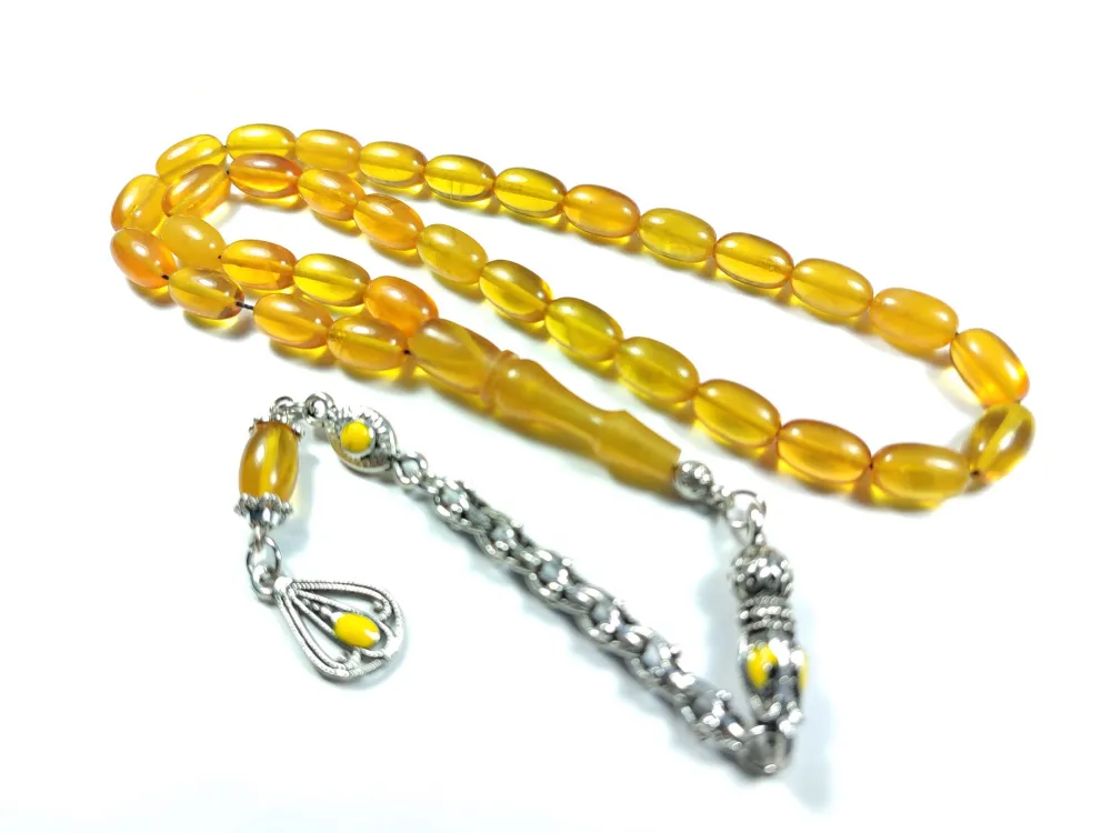 Alman Gümüş Püskül Kombi̇nli̇ 0.6 Deli̇m Sıkma Kehri̇bar