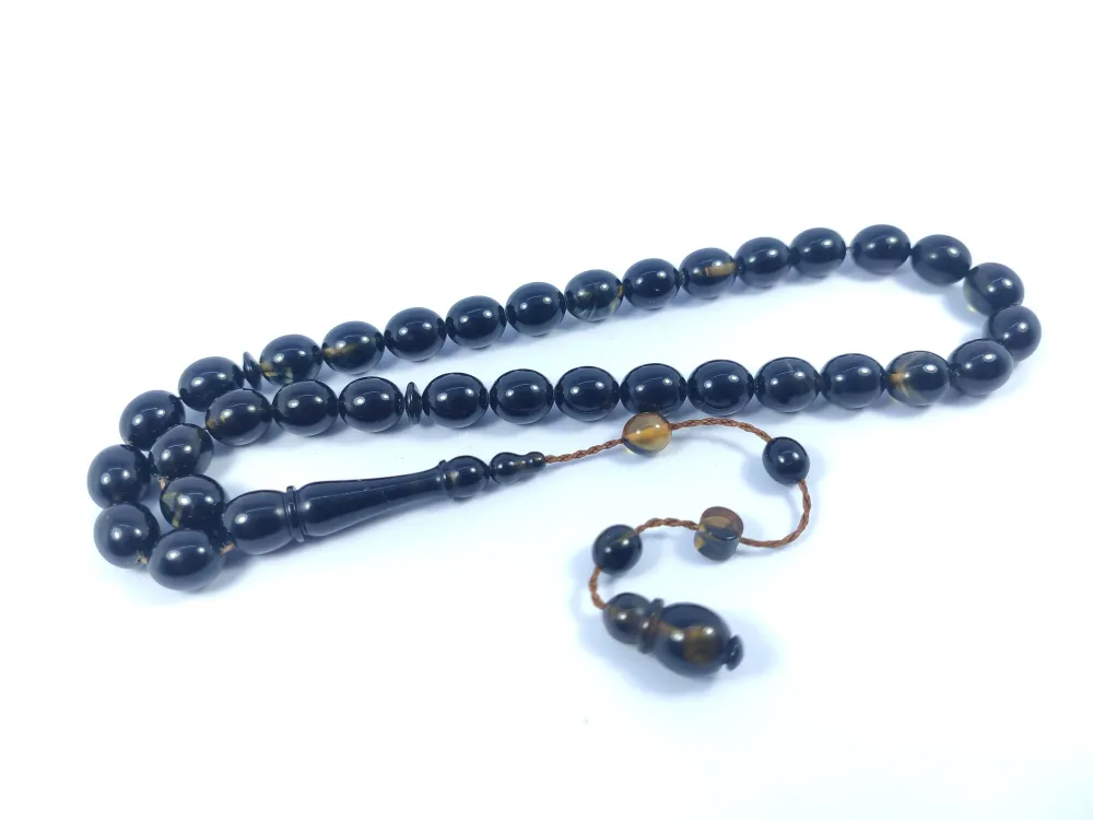 Şevket Alkan Usta Eseri̇ İnci̇ Si̇yahı 0.6 Mm Deli̇m Sıkma Kehri̇bar