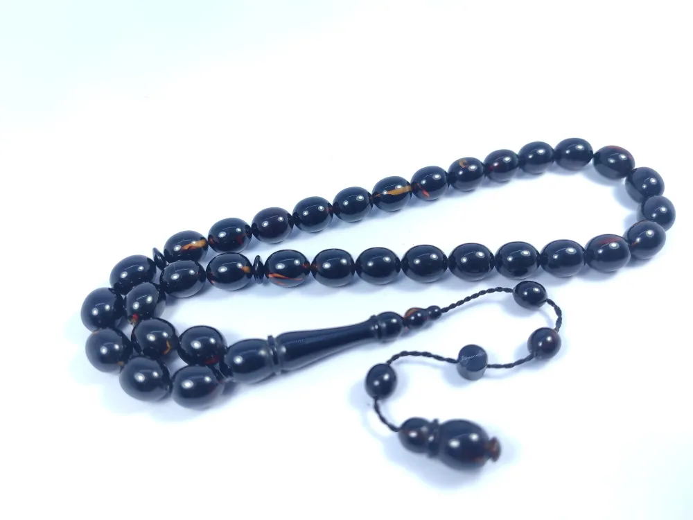 Şevket Alkan Usta Eseri̇ İnci̇ Si̇yahı 0.6 Mm Deli̇m Sıkma Kehri̇bar