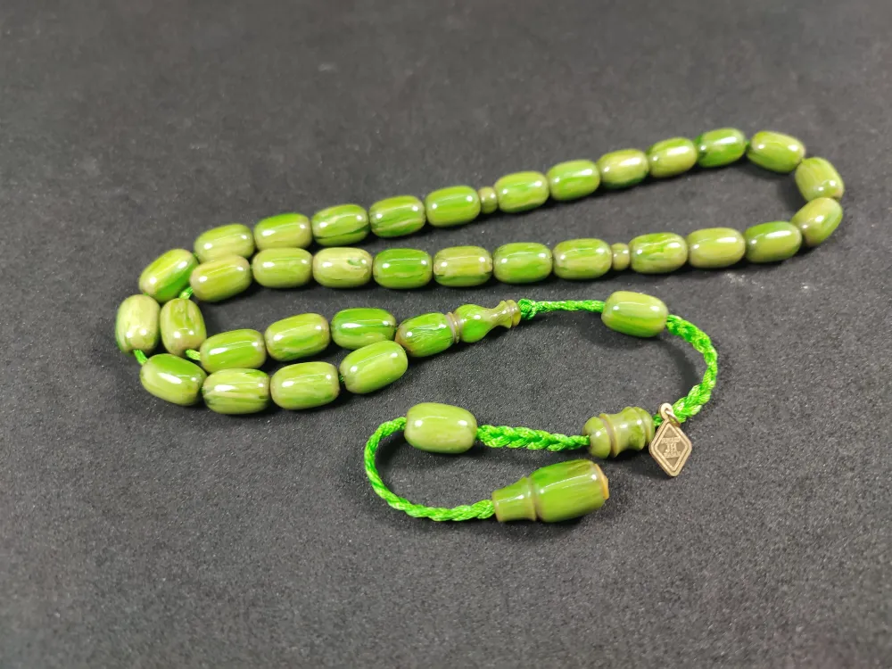 Junai̇d Hasan Usta Eseri̇ 12 Kat İpe Di̇zi̇lmi̇ş Anti̇k Model Bakali̇t