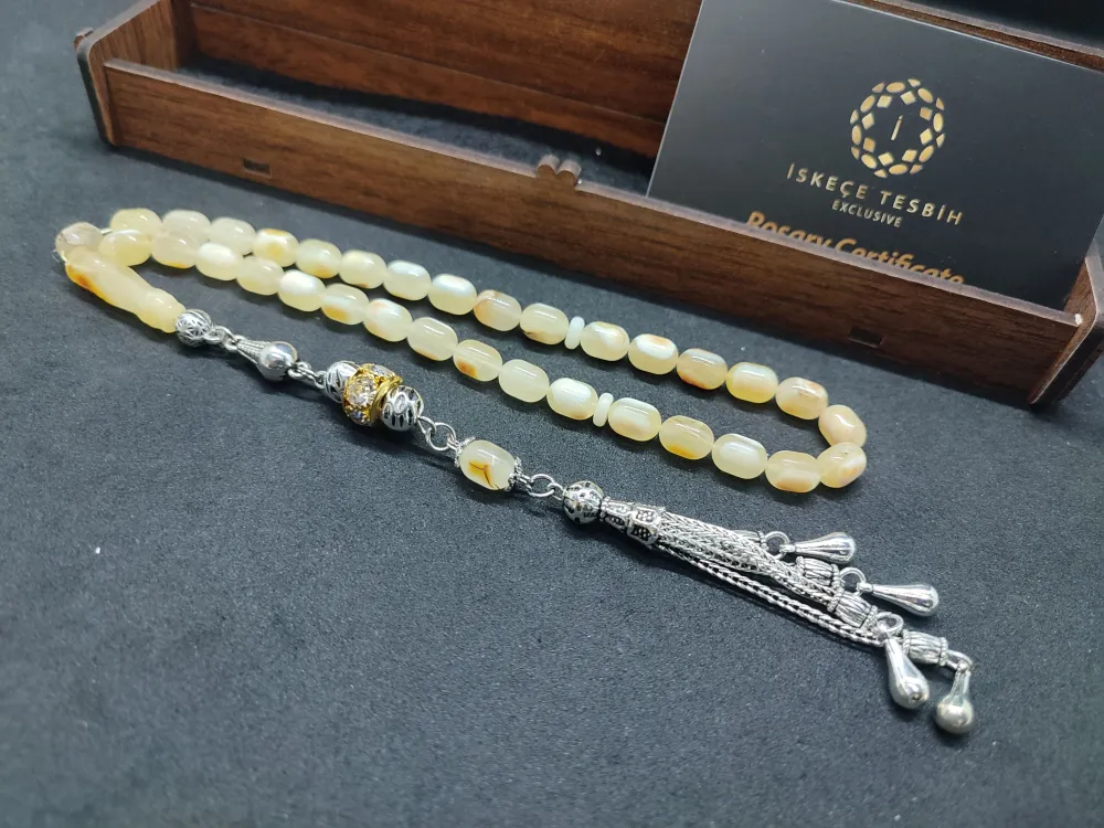 Ahşap Kutulu  6.75 Gr. Gümüş Püsküllü Toprak Fosi̇lli̇ 11.80 Gr. Rus Kaya Damla