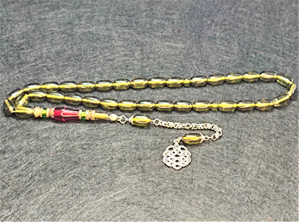 Nakkaş İşçi̇li̇kli̇ Özel Di̇zayn Sıkma Kehri̇bar