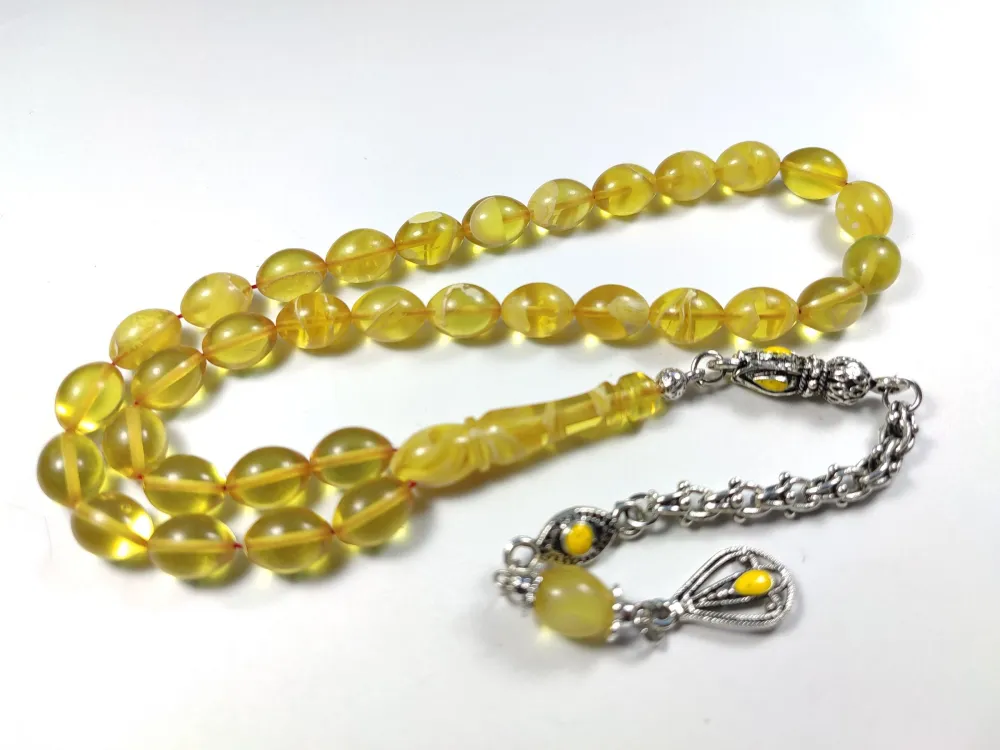 Alman Gümüş Püskül Kombi̇nli̇ 0.6 Deli̇m Sıkma Kehri̇bar