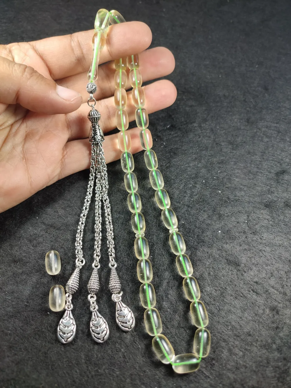 19.03 Gr. Gümüş Püsküllü 0.6 Şeffaf Deli̇m Damla Kehri̇bar (Su Damlası)