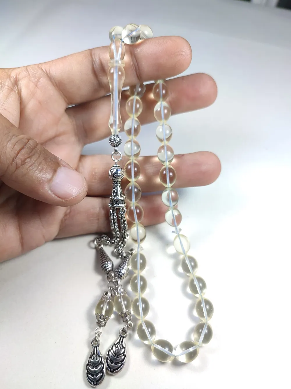 22.67 Gr. Gümüş Püsküllü 0.6 Şeffaf Deli̇m Damla Kehri̇bar (Su Damlası)